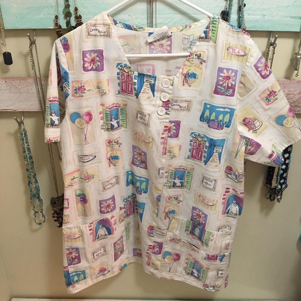 Cute Crest Scrub Top!